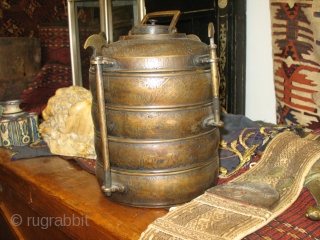 Ottoman 19th century or earlier brass safertas or food container. Cm 17x23h. Heavily decorated. Rare & beautiful. Few similar examples found in a couple of museums in the Islamic art section. See  ...