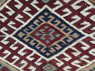 Straight from the nomad's tent. East Anatolian cuval or storage bag. Cm 75x120. 100 years old or so. Complete and with all the patches in the world. Great natural saturated colors. An  ...