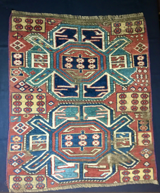 KASIM USHAG KARABAGH RUG FRAGMENT

Out of the blue came this lovely Caucasian rug fragment from Karabagh.
The size is cm 75x90 ca and it appears well proportioned.
Age I would say it could be  ...