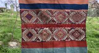 Malatya area, Sinanli tribe open cuval/storage bag. Cm 118x156. Late 19th, early 20th c. Flat weave plus sumack in the central part. Some metal thread. Natural colors. Two, three small holes, but  ...