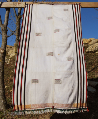 Nagaland. 
Naga Angami tribe cotton body cloth. 
Size is cm 92x173.
All cotton, hand loomed, super weaving.
Datable mid 20th century. 
In good condition, one stain to report, needs professional washing.
Acquired in Burma in  ...