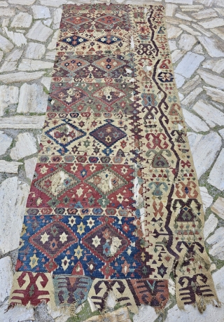 Aksaray Kilim Fragment
Cm 93x258
18th century
Condition issues as you see on pics.
Age, beauty, character, aura, colors. naturalcolors, pattern, stars, elibelinde,.....simply wonderful!

Available emailing to carlokocman@gmail.com
          