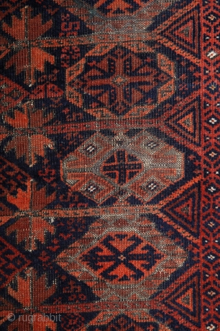 Baluch Timuri, a so called Sangtshuli; about 1880; 105 x 186cm (3`5”x 6`1”) rare seen main border (not found comparable border in Baluch rug books), like a row/chain of triangle amulets (an  ...