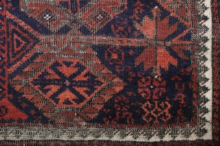 Baluch Timuri, a so called Sangtshuli; about 1880; 105 x 186cm (3`5”x 6`1”) rare seen main border (not found comparable border in Baluch rug books), like a row/chain of triangle amulets (an  ...