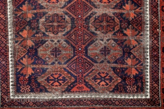 Baluch Timuri, a so called Sangtshuli; about 1880; 105 x 186cm (3`5”x 6`1”) rare seen main border (not found comparable border in Baluch rug books), like a row/chain of triangle amulets (an  ...