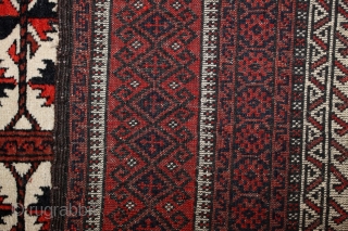 Baluch white ground Prayer rug; beginning 20th c.; 98 x 166 cm (3`3” x 5`5”); one says that Baluch prayer rugs with white ground are rare, this one has also in its  ...