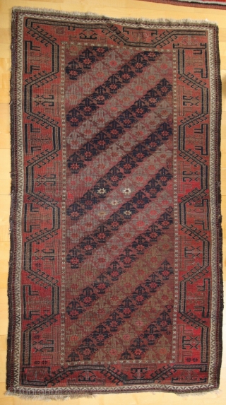 Baluch rug; study piece; 104 x 183 cm (3`5“ x 6`0“); between 1870 and 1900; diagonal shrub design known from Taimani or "Doktor-i-ghazi"; shrubs colour is in every second diagonal an ugly  ...