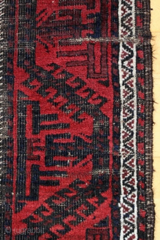 Baluch small carpet; around 1900; 126/9 x 211 cm (4`2” x 7`11”); natural colours with shining “Baluch-blue”, some abrashed areas and foldes with abrases like shown on the pictures; please ask for  ...