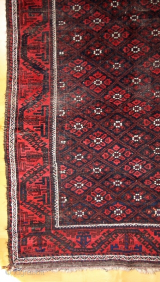 Baluch small carpet; around 1900; 126/9 x 211 cm (4`2” x 7`11”); natural colours with shining “Baluch-blue”, some abrashed areas and foldes with abrases like shown on the pictures; please ask for  ...