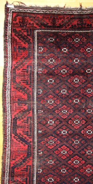 Baluch small carpet; around 1900; 126/9 x 211 cm (4`2” x 7`11”); natural colours with shining “Baluch-blue”, some abrashed areas and foldes with abrases like shown on the pictures; please ask for  ...