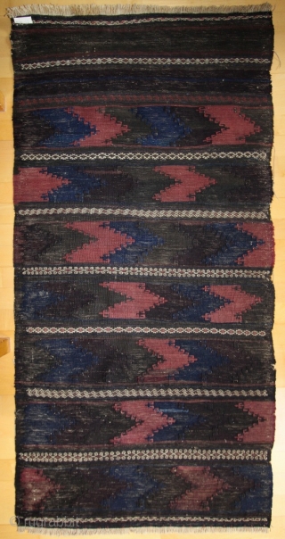 Baluch Kelim, maybe part of a rug or the back of a khorjin set, around 1900; 87 x 166 cm (2`10” x 5`5”);  made in very  elaborate techniques and   ...