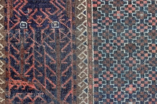 Baluch (prayer rug?); end 19th c.; study piece with a for me unusual border, 
low pile, unfortunately with heavy, ugly running blue ink „re-colouration“ last picture is its back side
   