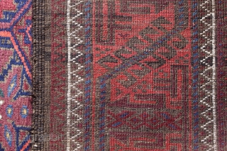 Baluch long rug runner; 118 x 393 cm (3`11“ x 12`11“); after 1920 (?) earlier example from a rare size for Baluch rugs; Main field with a lattice which contains alternating diagonal  ...