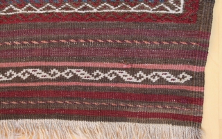 Baluch long rug runner; 118 x 393 cm (3`11“ x 12`11“); after 1920 (?) earlier example from a rare size for Baluch rugs; Main field with a lattice which contains alternating diagonal  ...
