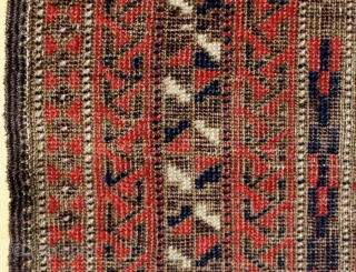 Baluch prayer rug; 86 x 156 cm (2`10“ x 5`2“); around 1900; fragment; apart from condition a very interesting study piece; main field and hand panels are filed with trees of life,  ...