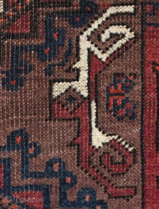 Baluch rug; size 117 x 188 cm (3`10" x 6`1"); 
In a vertical row four big, precisely drawn Salor Güls are allocated on a brown main filed. As secondary Gül one find  ...