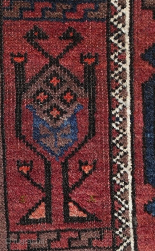 Baluch rug; size 117 x 188 cm (3`10" x 6`1"); 
In a vertical row four big, precisely drawn Salor Güls are allocated on a brown main filed. As secondary Gül one find  ...