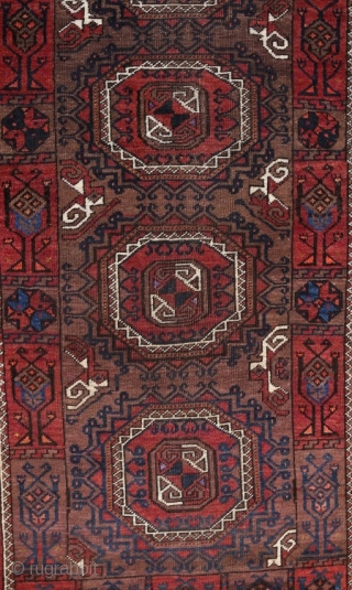 Baluch rug; size 117 x 188 cm (3`10" x 6`1"); 
In a vertical row four big, precisely drawn Salor Güls are allocated on a brown main filed. As secondary Gül one find  ...