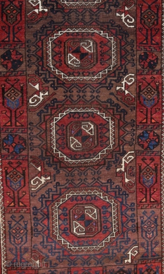 Baluch rug; size 117 x 188 cm (3`10" x 6`1"); 
In a vertical row four big, precisely drawn Salor Güls are allocated on a brown main filed. As secondary Gül one find  ...