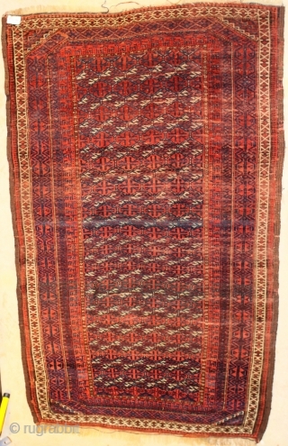Baluch rug; last q 19th.c.; 107x172cm (3`6" x 5`8"); Azadi names this type "Maadan" (plate 35 & 36) because of its corner design and the "Goat-Run" border. This is the oldes piece  ...