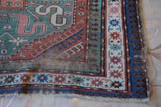 Old Caucasian Kazak Worn + Damage . Circa 1800s.1900  Size is 4.4 x 7 (134 x 213 cm)

Price $250.00 + Shipping           