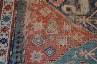 Old Caucasian Kazak Worn + Damage . Circa 1800s.1900  Size is 4.4 x 7 (134 x 213 cm)

Price $250.00 + Shipping           