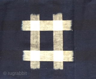 Indigo dyed kasuri futon-ji, Japan c.1900. The futon cover is made of homespun, hand woven cotton in the traditional four strips, joined with hand stitching. The e-gasuri (picture ikat) design is the  ...
