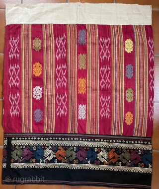 A sinh (traditional tubular skirt) hand woven in cotton and silk; the material is fairly soft. Bought in Phonsavan, Laos, it was acquired with other pieces that were clearly used, but this  ...