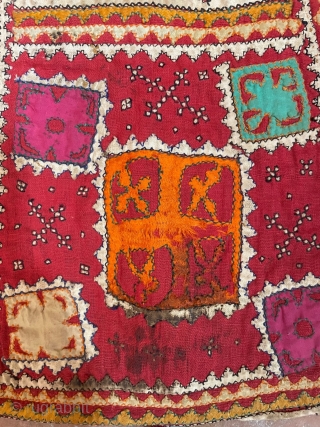 Tobacco bag from Sindh. Applique, patchwork and embroidery on a cotton ground. Mid 20th century. Shows signs of wear (see photos), but is cheerful and attractive.       