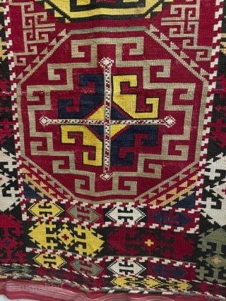 Uzbek napramach embroidered in tightly twisted silk on a plain cotton ground. The medallion design and the colours are very typical. It has been suggested that these motifs, which parallel those found  ...