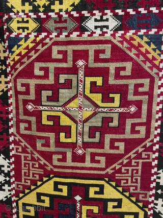 Uzbek napramach embroidered in tightly twisted silk on a plain cotton ground. The medallion design and the colours are very typical. It has been suggested that these motifs, which parallel those found  ...