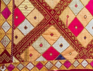 Phulkari from the Punjab embroidered in soft floss silk in shades of yellow, cream, pink and pale green with touches of violet, on rather coarse rust coloured khaddar (hand-loomed cotton) in two  ...
