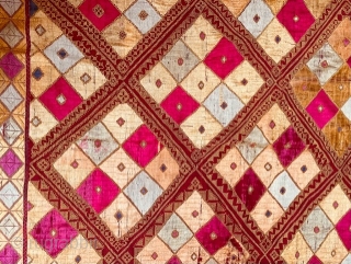 Phulkari from the Punjab embroidered in soft floss silk in shades of yellow, cream, pink and pale green with touches of violet, on rather coarse rust coloured khaddar (hand-loomed cotton) in two  ...