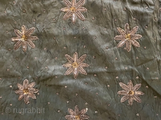 Silk embroidered with silver metal sequins. A small section (55x63cm) almost certainly from a wedding garment. In Tunis, around the turn of the century, the bride's costume had many meters of silk  ...