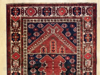 2'6'' x 3'6'' / 81cm x 107cm An antique Beshir rug rich colours with a stunning border from west Turkestan.

             