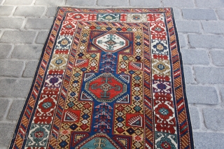 Wonderful Kuba Shirvan in brillant Yellow Field with Surahani Design and Kufic Border!

The rug doesnt really show its own beauty on Main Photo, detail photos gives better idea about the colors and  ...