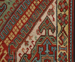 Master Village Oushak from 1850 perhaps earlier with yellow field border.
Unusual composition with tribal figures.

Size: 235x183 cm (7.8 x 6 ft.)
More pictures available (All pictures are taken in the sun light)  