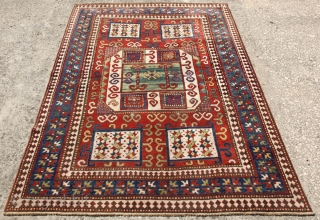 This is very colorful example of A type Georgian Karachoph from Late 19th C. It has lovely  abrashed green center.

The size: 5.5 x 7.2 ft (165 x 220cm)
    