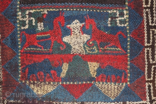 This charming piece is a tableau of Nomadic life. One side of the saddle cloth depicts a small monastery building, with a rider on horseback on the left and a Tibetan mastiff  ...