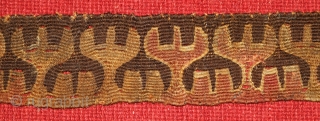 Central Asian wool tapestry fragment. 2.5  x 30 inches. Both sides have the original selvedge. The design is a row of reciprocal antlers, probably denoting a clan symbol. Approximately 2000 years  ...