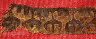 Central Asian wool tapestry fragment. 2.5  x 30 inches. Both sides have the original selvedge. The design is a row of reciprocal antlers, probably denoting a clan symbol. Approximately 2000 years  ...