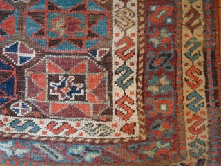 The colours are lovely in this mellow antique Kurdish village rug c1880.
Condition: good with even wear.  
Size: 217x137 cm (7' 1" x 4' 6")
I am closing down so the rug is  ...