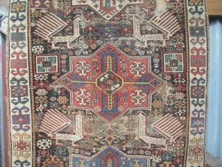 'Akstafa'long rug 91x41in.231x104cm.   Some good pile some wear some holes.                     