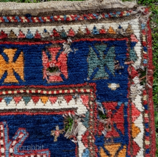 Charming, powerful Karabagh rug, a fireworks of joy, 218x128cm. Full pile, all endings original, gently washed. Some small holes, easy to repair.           