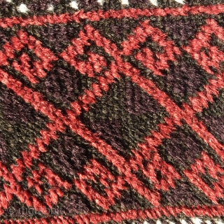 Antique Baluch, 142x84cm, warm coral red and plenty aubergine, selvedges are made with goat hair . Gently washed. Please contact me here : christinawiese.ceramic@gmail.com         