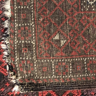 Antique Baluch, 142x84cm, warm coral red and plenty aubergine, selvedges are made with goat hair . Gently washed. Please contact me here : christinawiese.ceramic@gmail.com         