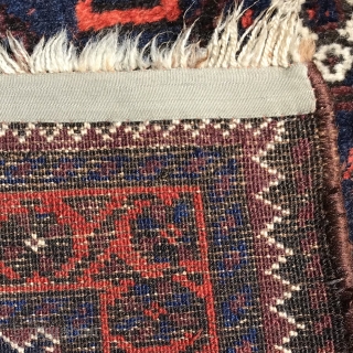 Sweet, small Arab Baluch, 127x81 cm, saturated colours , coral, the red of unripe blackberries, 2 shades of indigo and  olive green which is brown looking in the shadow, lustrous wool,  ...