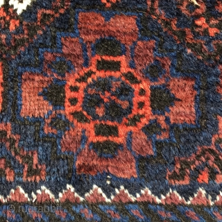 Sweet, small Arab Baluch, 127x81 cm, saturated colours , coral, the red of unripe blackberries, 2 shades of indigo and  olive green which is brown looking in the shadow, lustrous wool,  ...