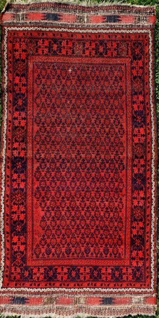 Persian Baluch, 178x92cm, 19th century, gently washed, glorious red, waiting to glow in your home.                  