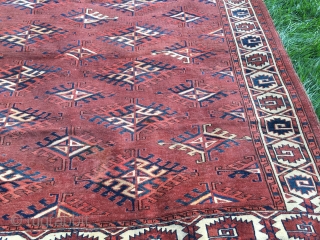 Early Yomud main carpet, 5'1" x 9'0". Even low pile.  Sides and ends original, approximately 1% expert field restoration.  The spacious drawing of this usually crowded pattern and somewhat archaic  ...